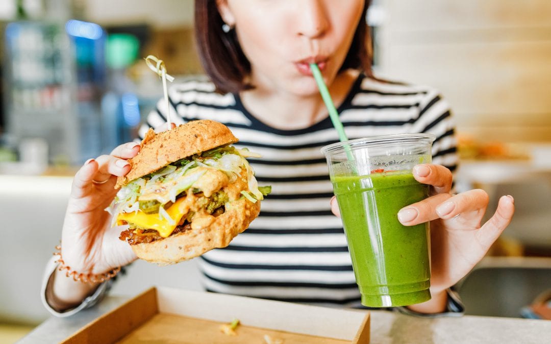 Customer tries new vegan burger and smoothie